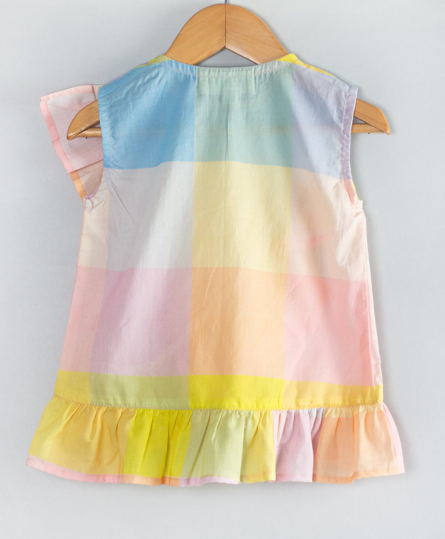 MULTI CHECK PRINT TOP WITH FRILL ACCROSS FRONT
