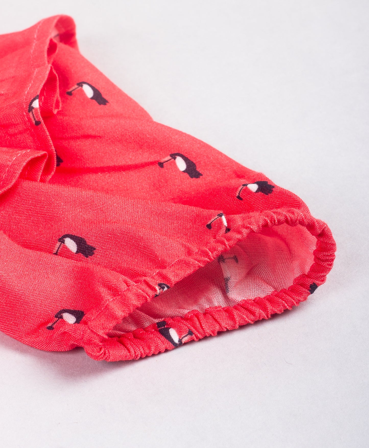 RED TOP WITH ALL OVER BIRD PRINT