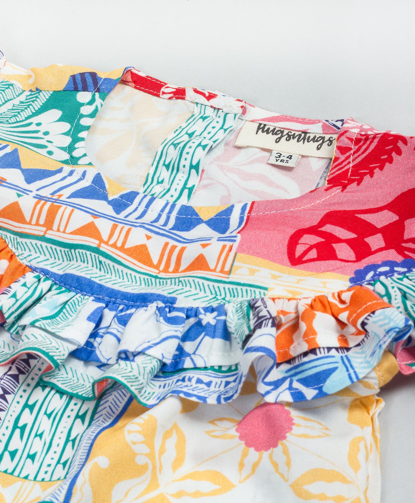 PATCH PRINT CUTSLEEVES TOP WITH FRILL ALONG THE YOKE