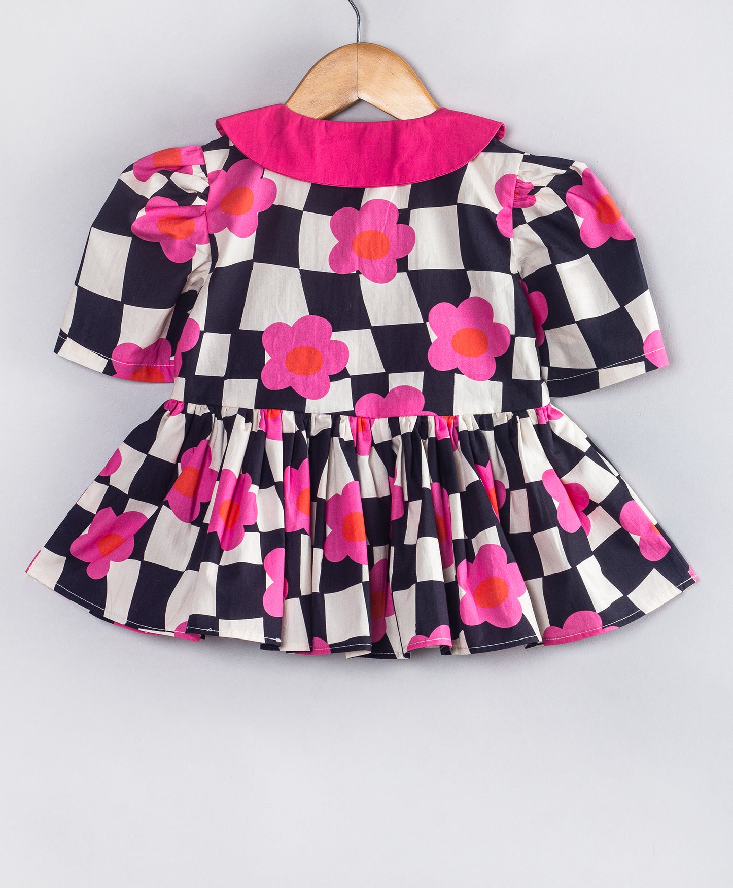 BLACK AND WHITE CHECK PRINT PEPLUM TOP