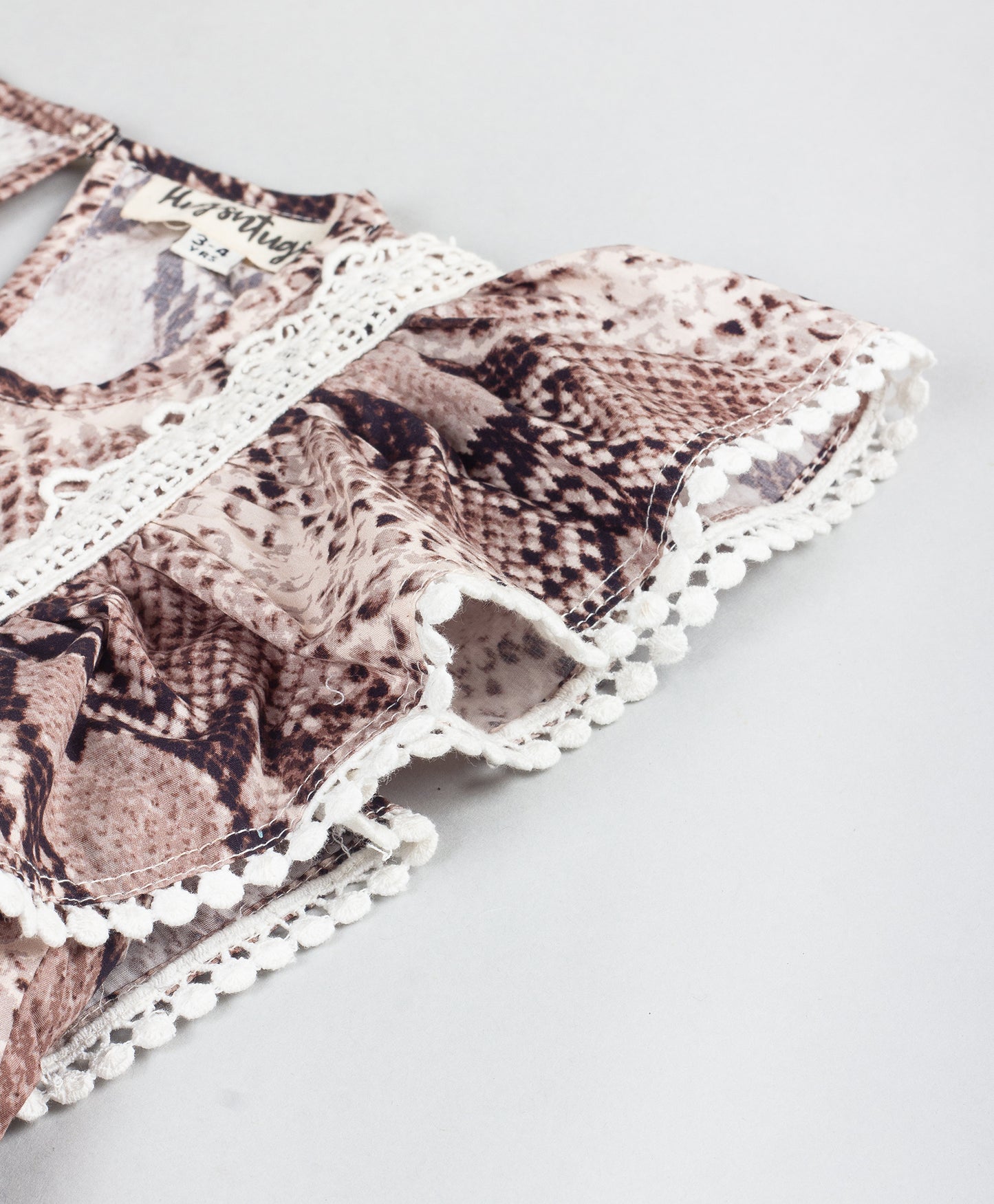 ANIMAL SKIN PRINT PEPLUM TOP