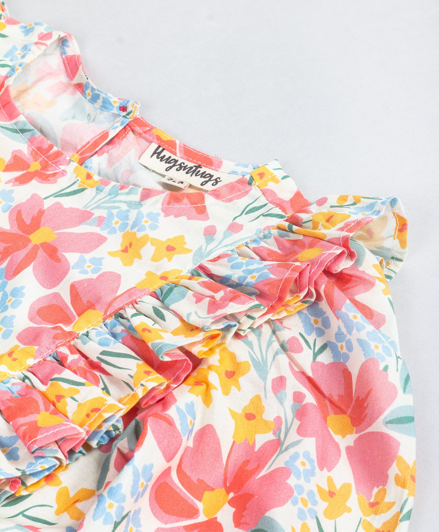PINK FLORAL FULL SLEEVES TOP WITH FRILLS ON SIDE SEAMS
