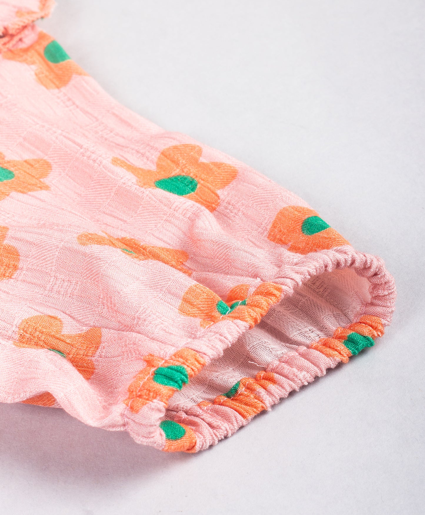 PASTEL PINK TOP WITH ORANGE FLOWERS TOP