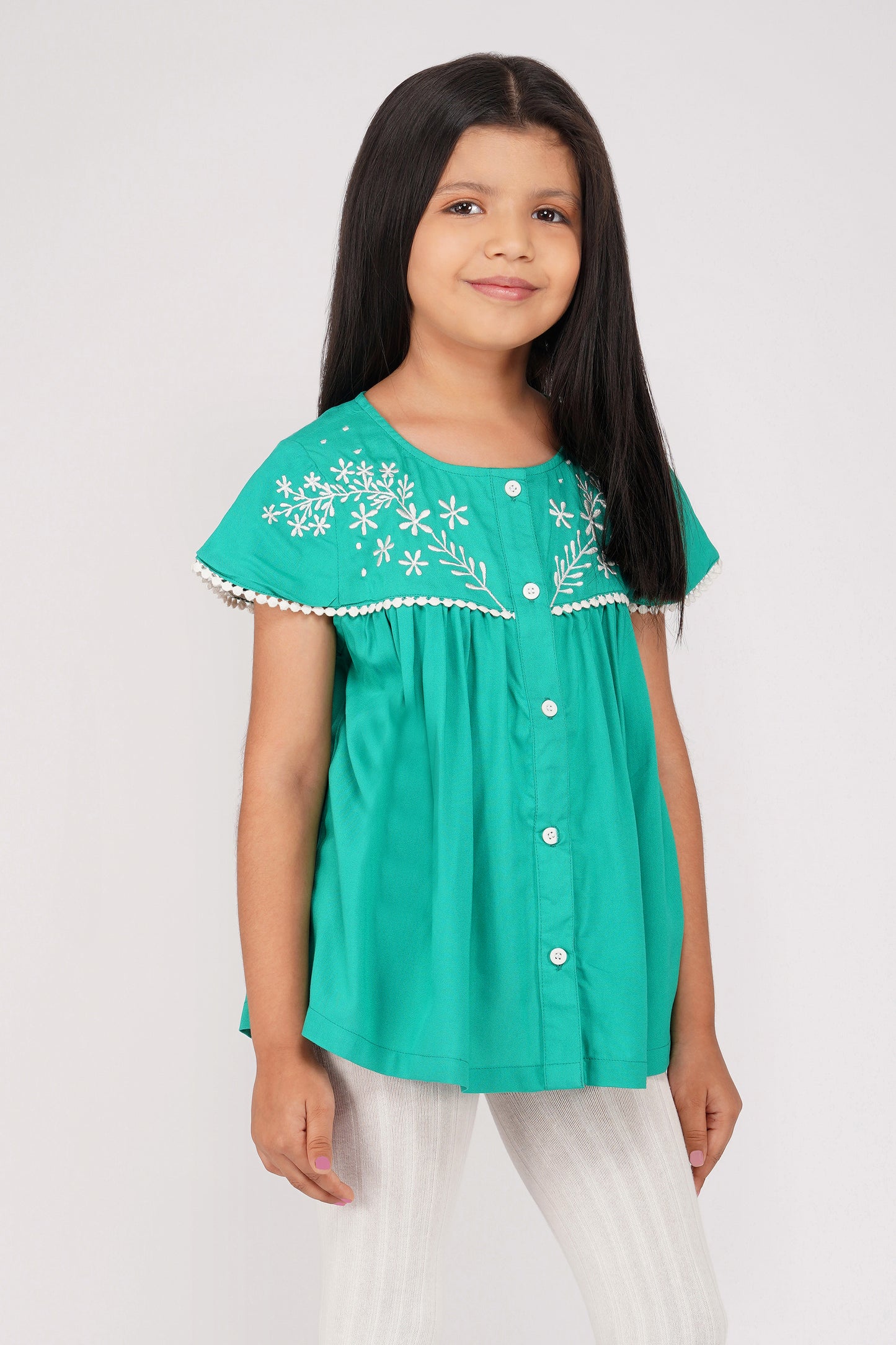 SOLID GREEN TOP WITH ECRU EMBROIDERY ON THE YOKE