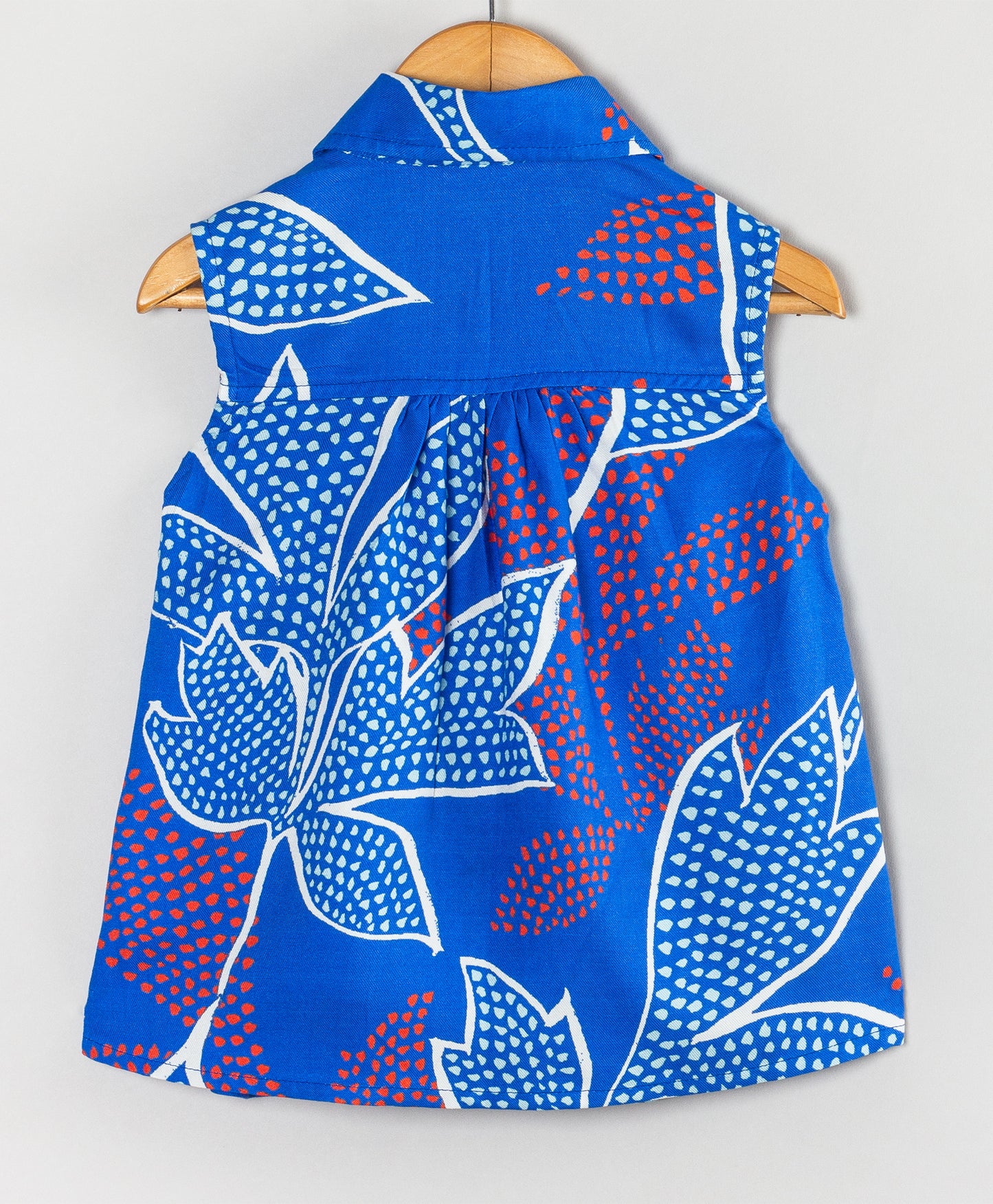 ROYAL BLUE LEAF PRINT BUTTON DOWN FRILL TOP