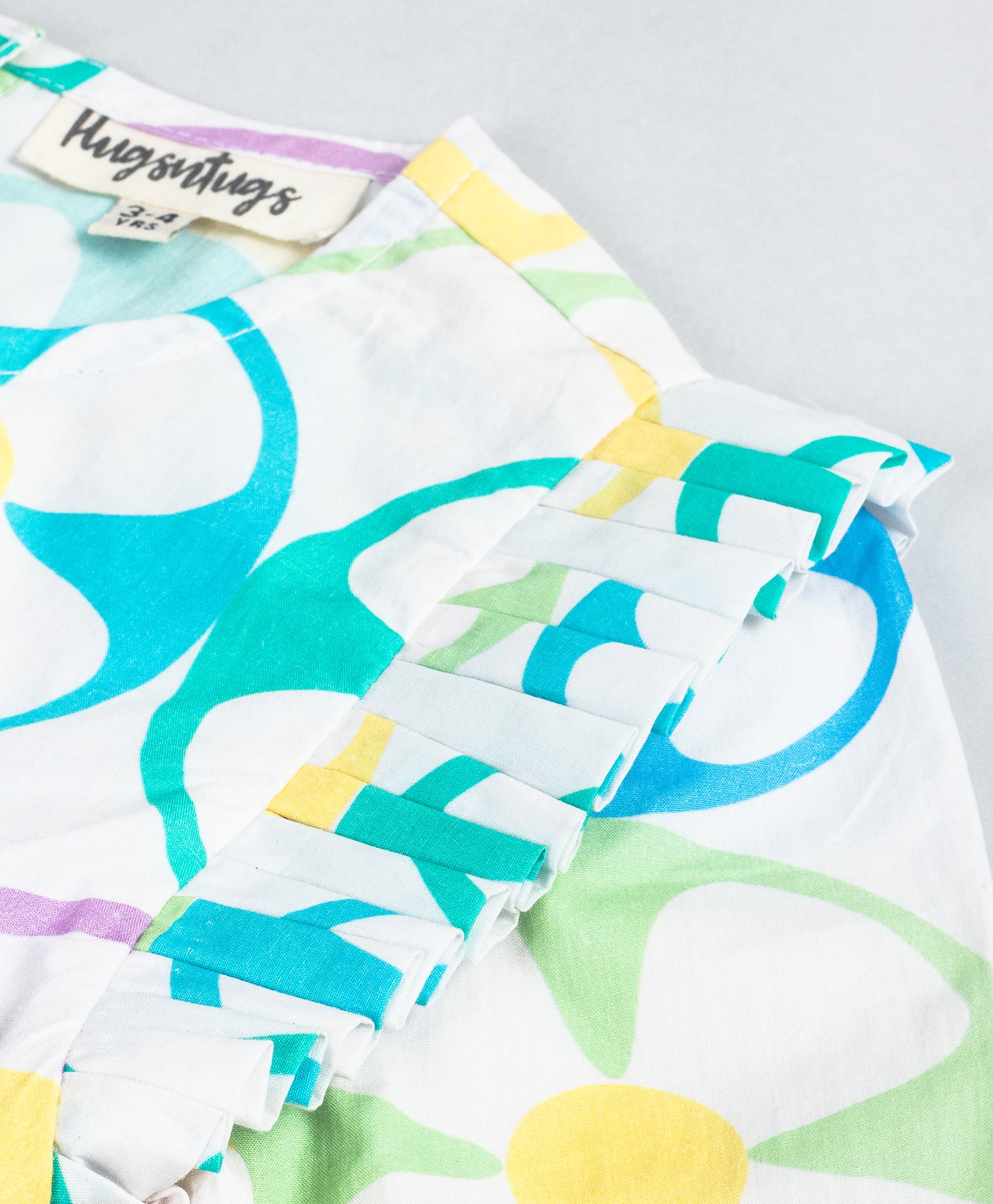 GEOMETRIC FLORAL PRINT DRESS WITH BOW AT WAIST