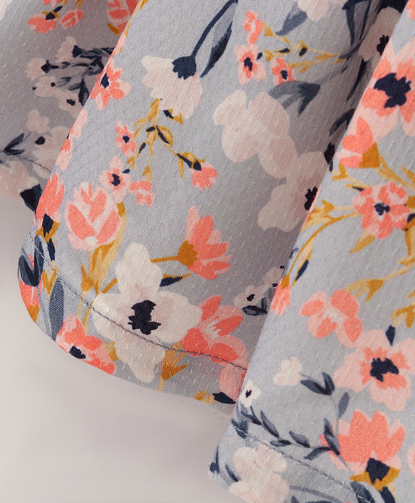 Sleeveless All Over Flowers Printed A Line Top With Contrast Edging On Shoulder Frills - Grey & Pink