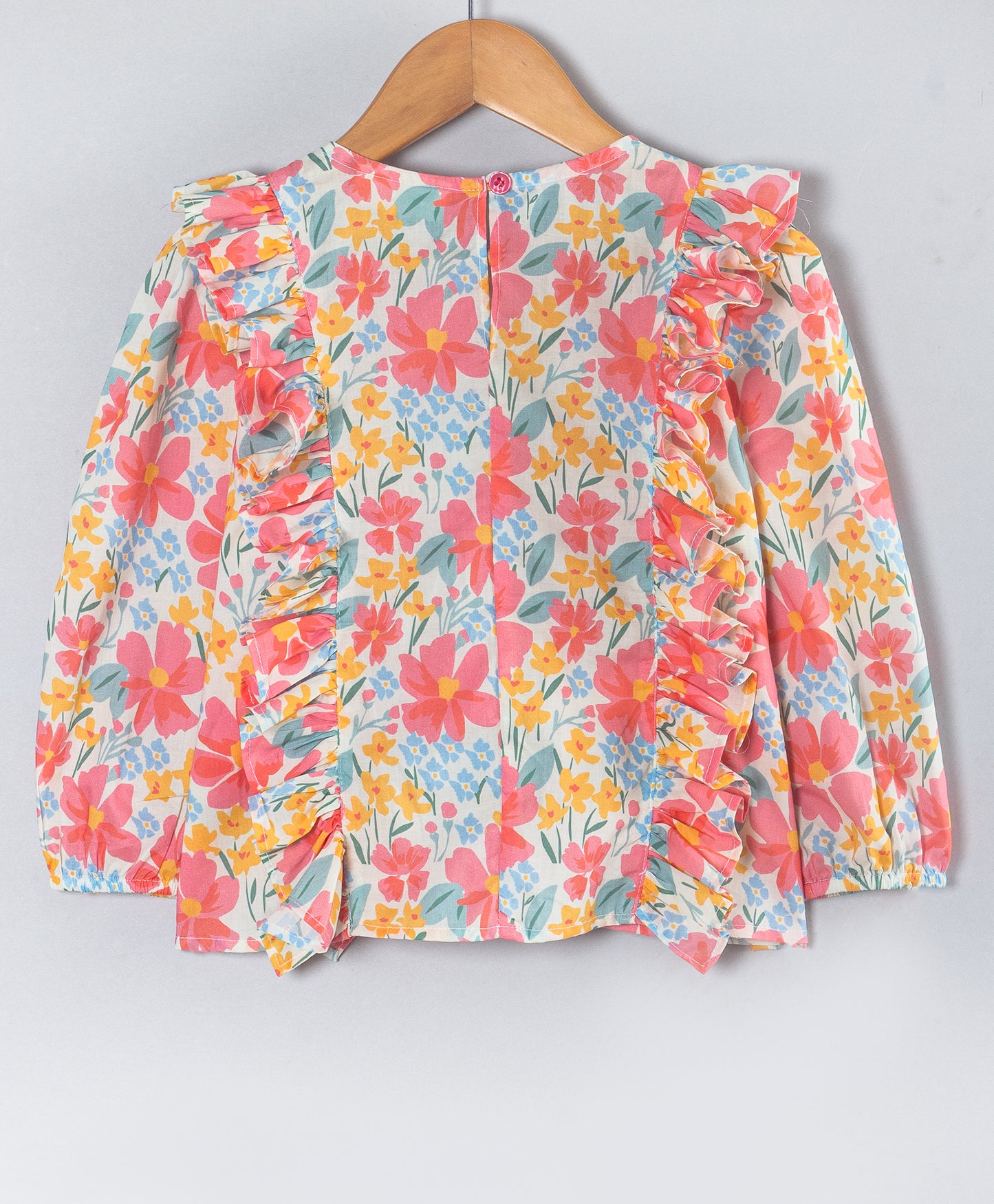 PINK FLORAL FULL SLEEVES TOP WITH FRILLS ON SIDE SEAMS