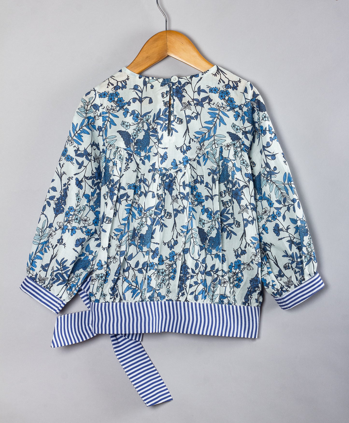 BLUE LEAVES PRINT TOP WITH STRIPE TIE UP AT THE BOTTOM
