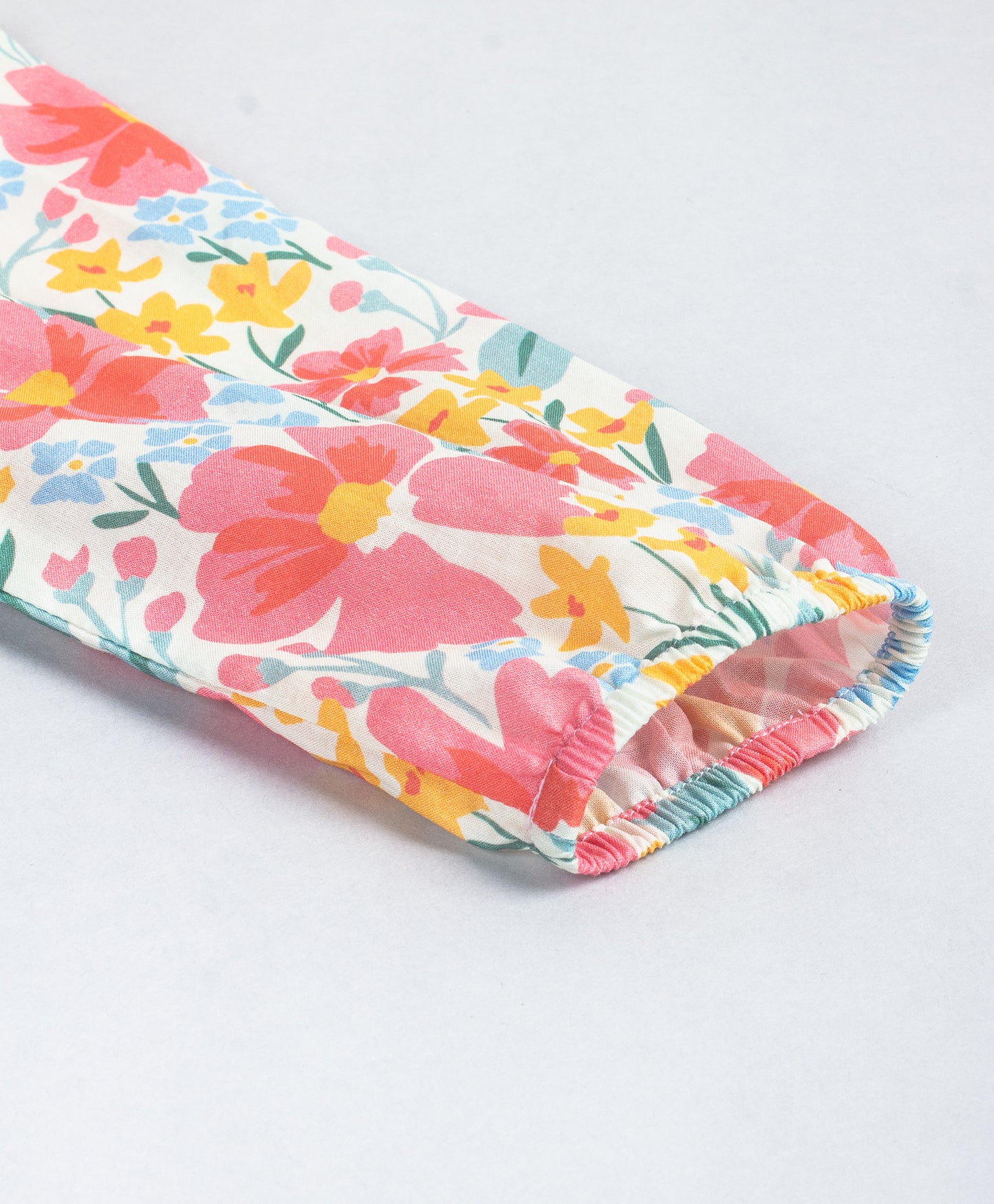 PINK FLORAL FULL SLEEVES TOP WITH FRILLS ON SIDE SEAMS