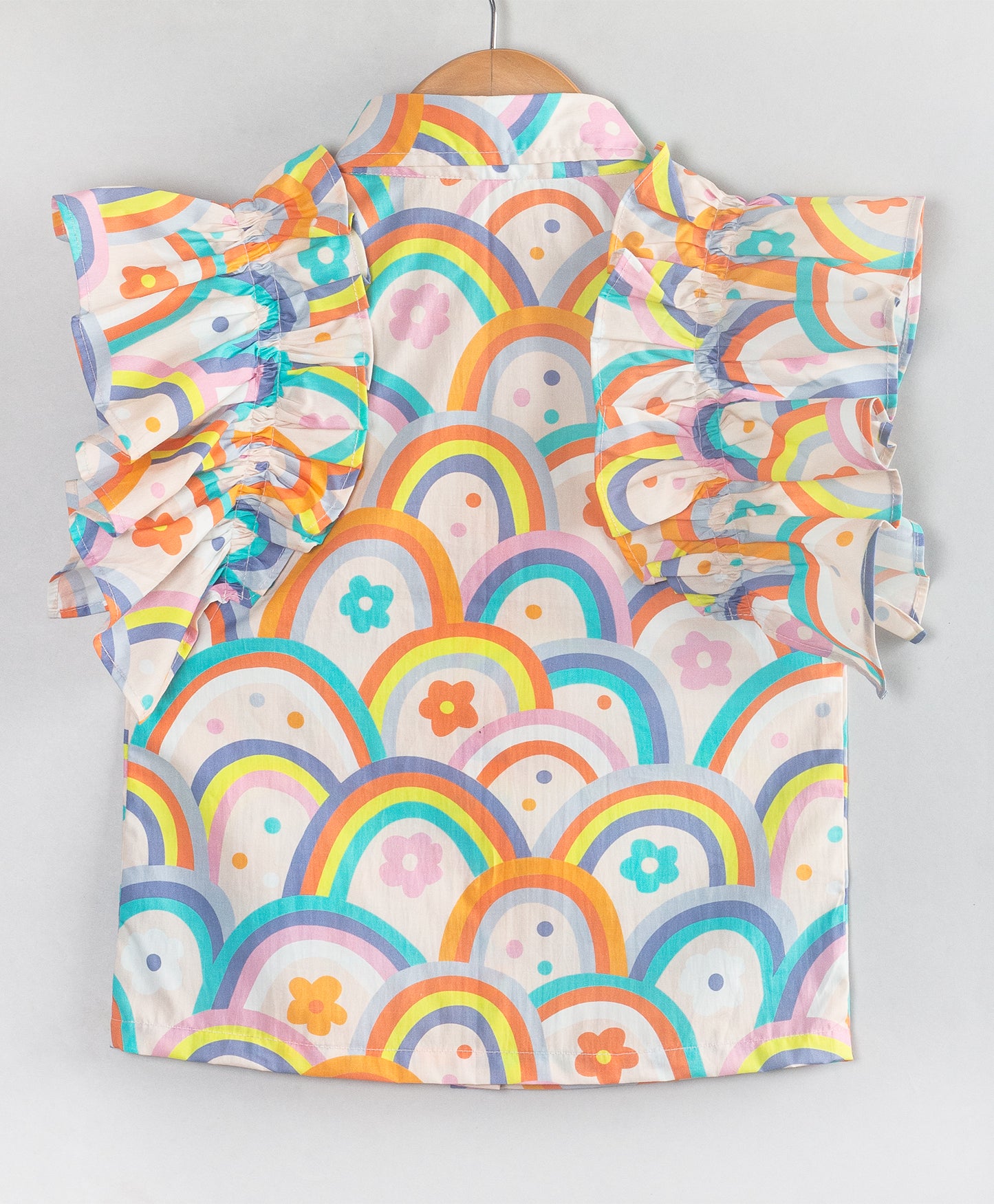 RAINBOW PRINT TOP WITH RUFFLES ALONG THE ARMHOLE