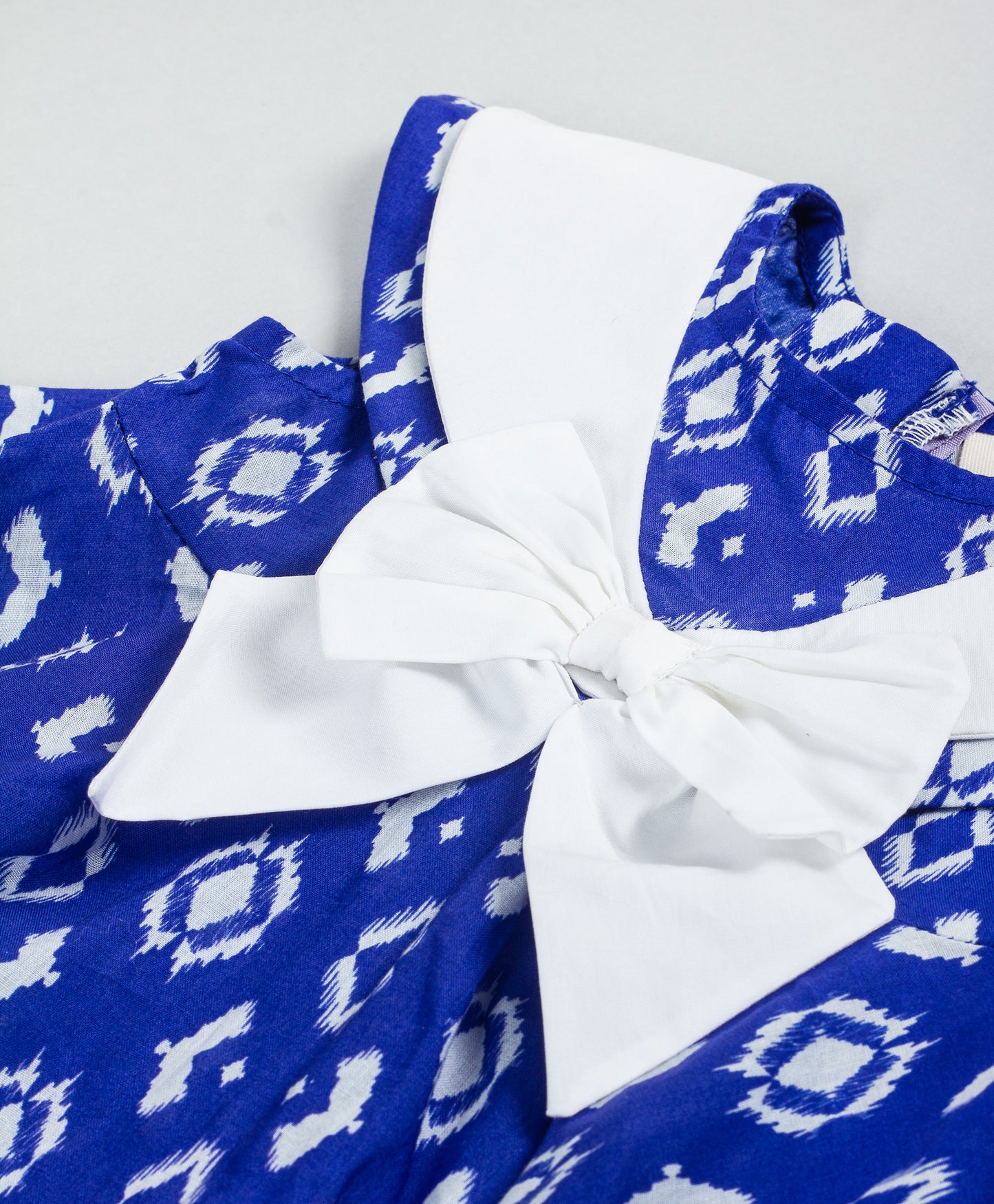 ROYAL BLUE PRINTED INFANT DRESS WITH BOW