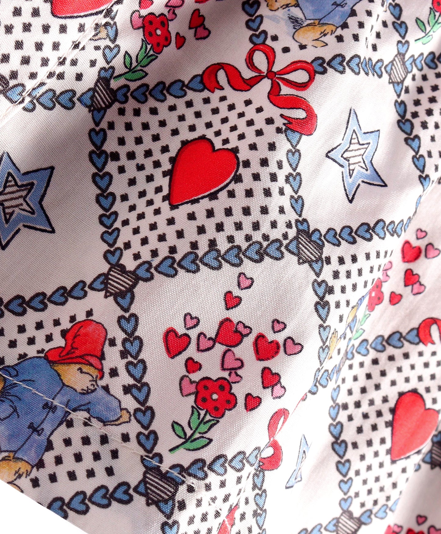 BUSY HEART IN CHECK PRINT WITH BOWTIE AT NECK
