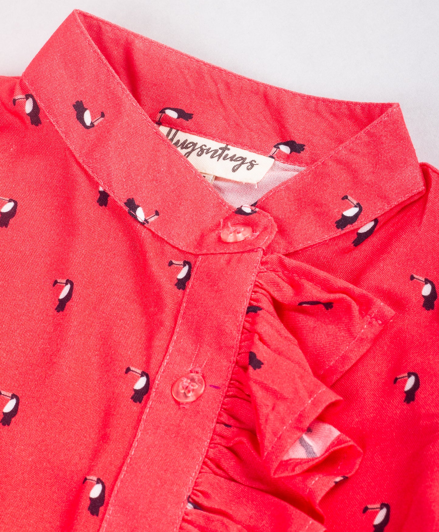 RED TOP WITH ALL OVER BIRD PRINT