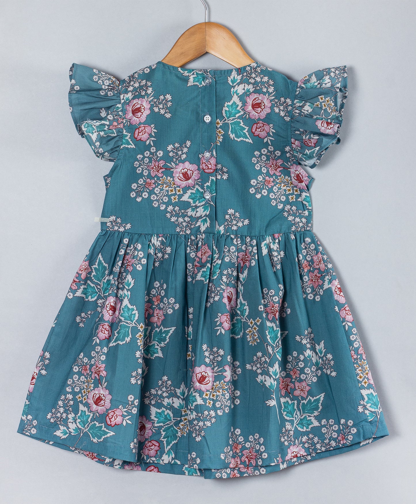 TEAL BLUE FLOWER PRINT DRESS WITH CORAL BOWS ON SIDE WAIST