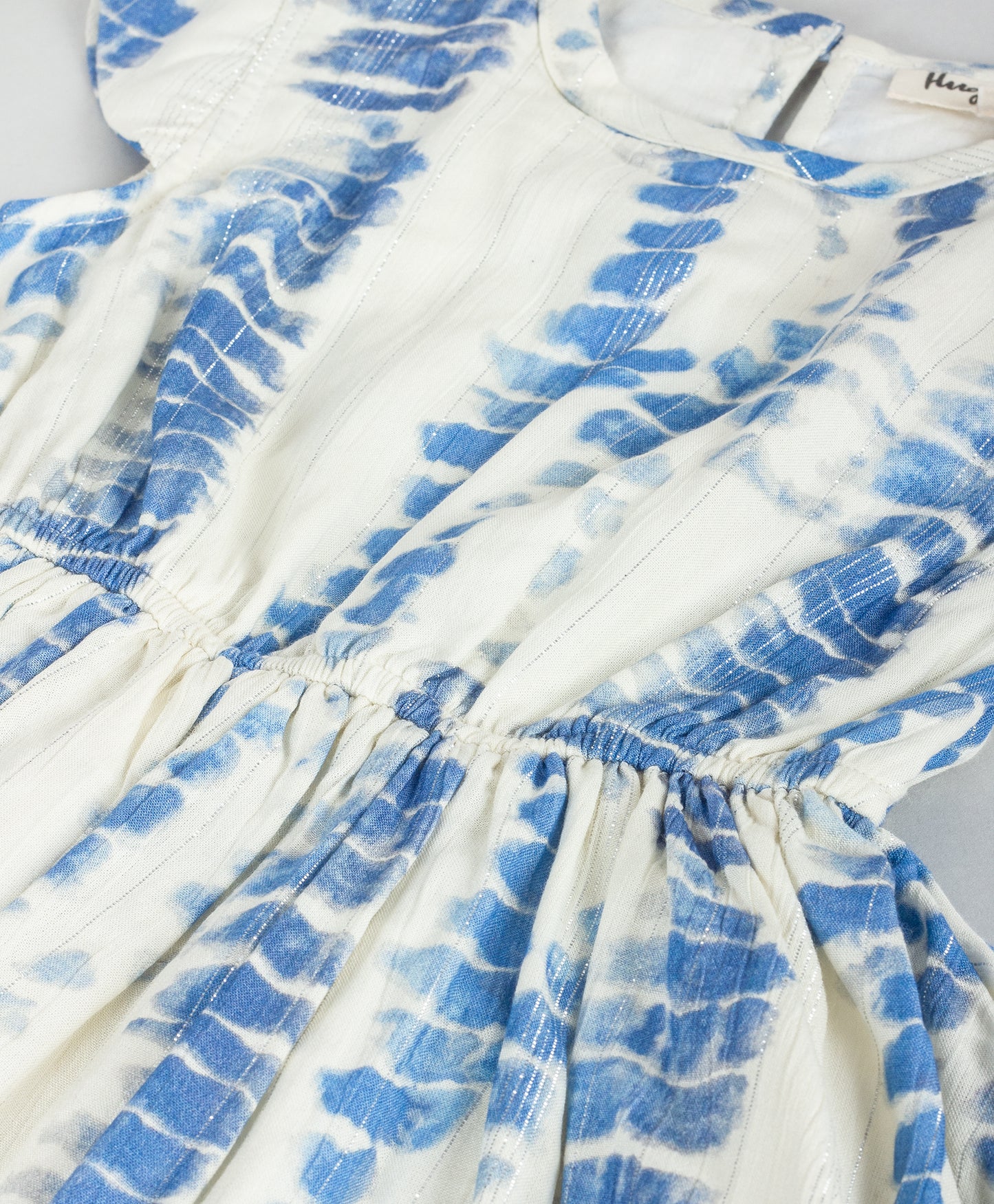 TIE AND DYE PRINT DRESS WITH HIGH LOW FLOUNCE HEM