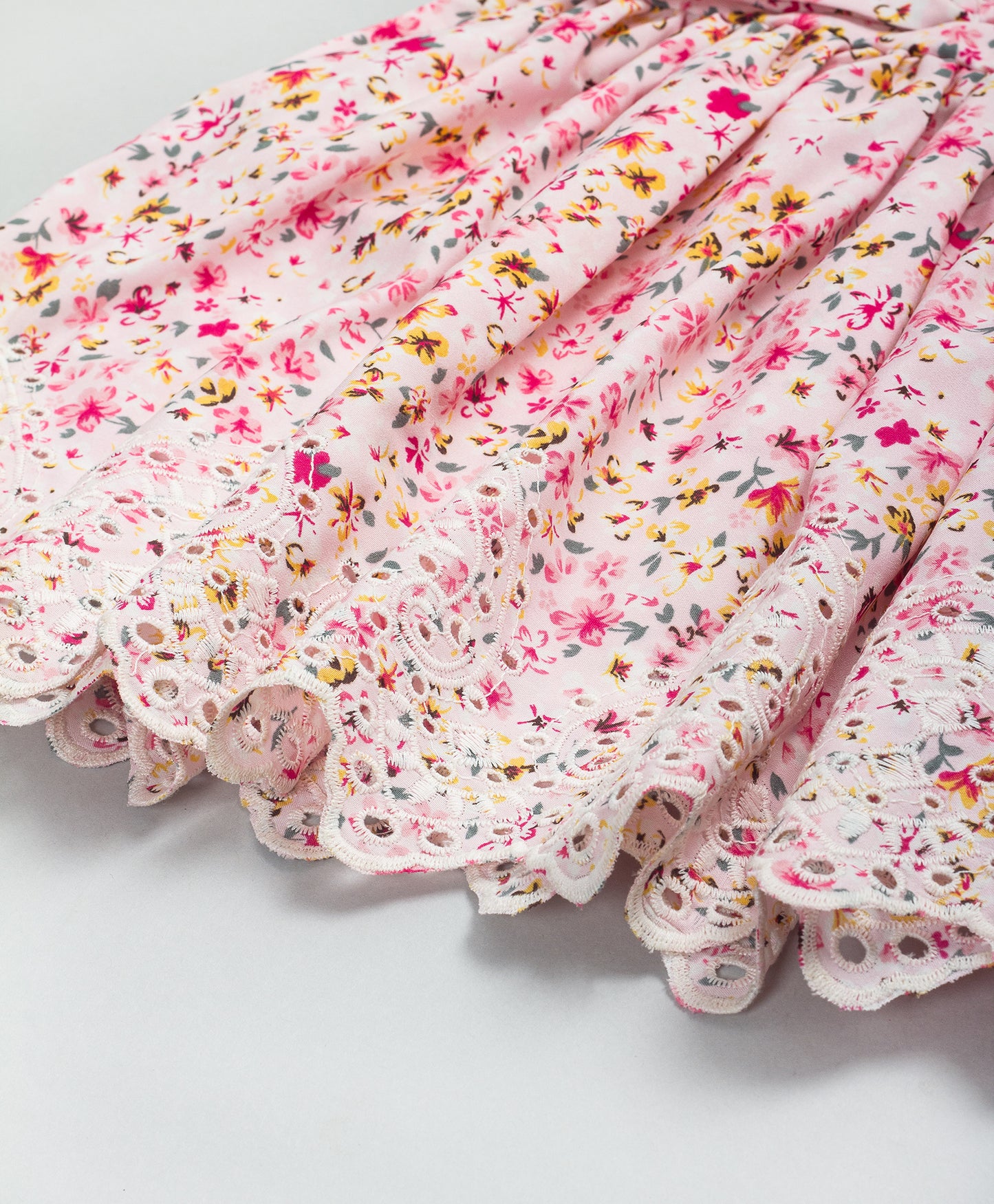 PINK FLORAL DRESS WITH EMBROIDERED BOTTOM