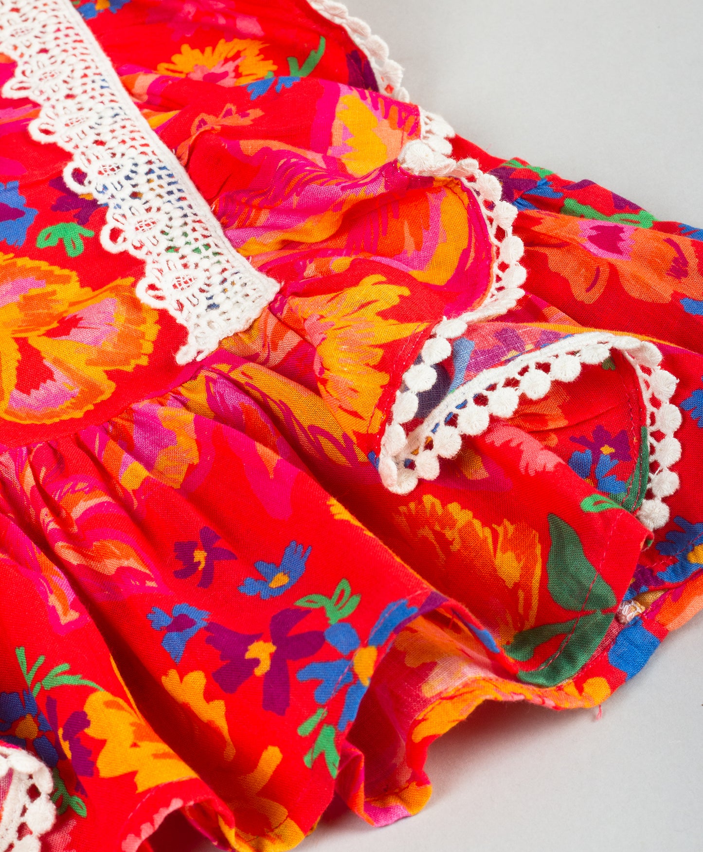 RED FLORAL PRINT PEPLUM TOP WITH CONTRAST LACE