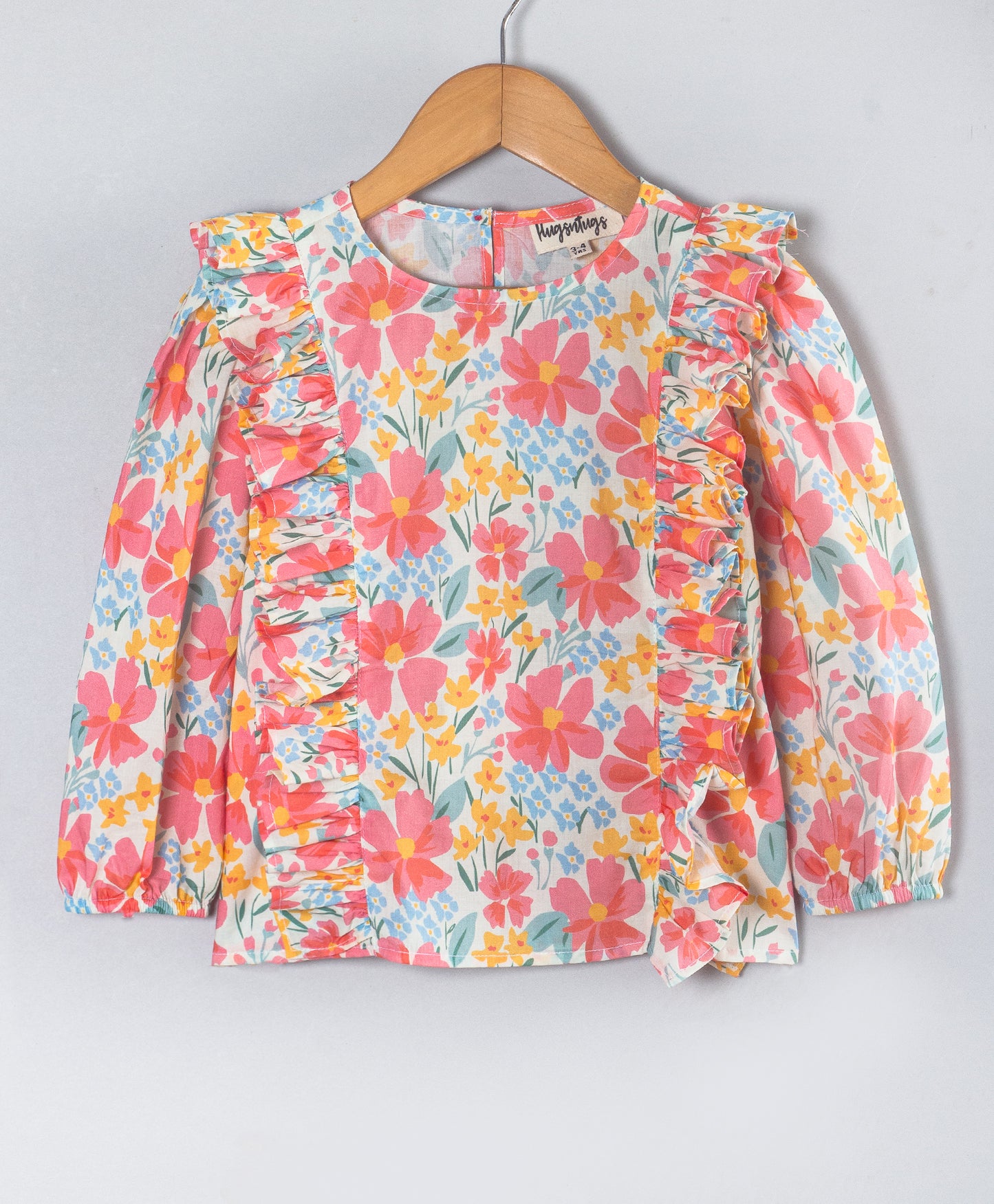 PINK FLORAL FULL SLEEVES TOP WITH FRILLS ON SIDE SEAMS