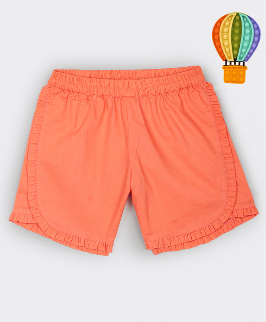 Orange shorts with frill detailing on the seams and bottom