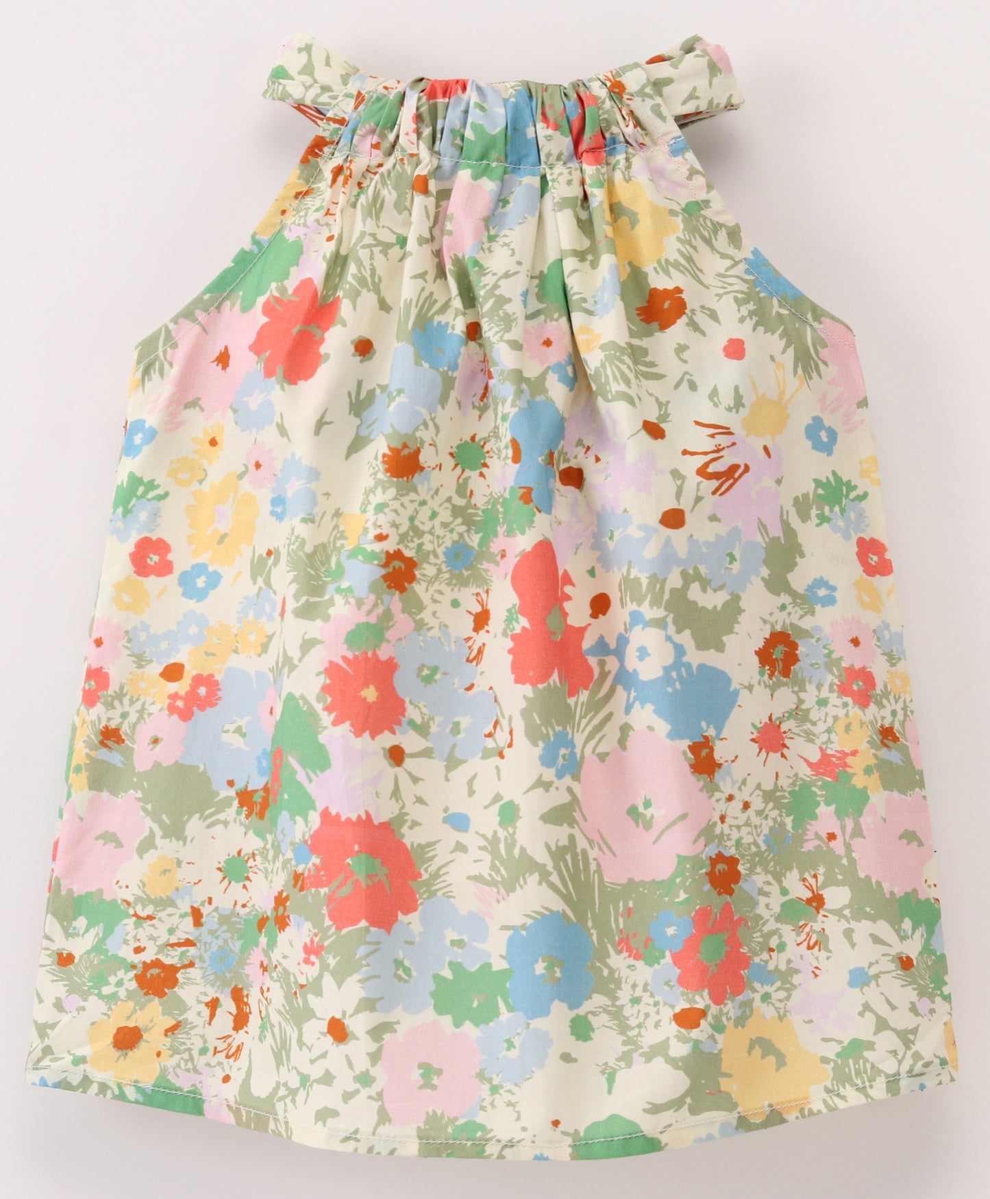 Pastel Floral print top with cut out at back and tie up at back neck
