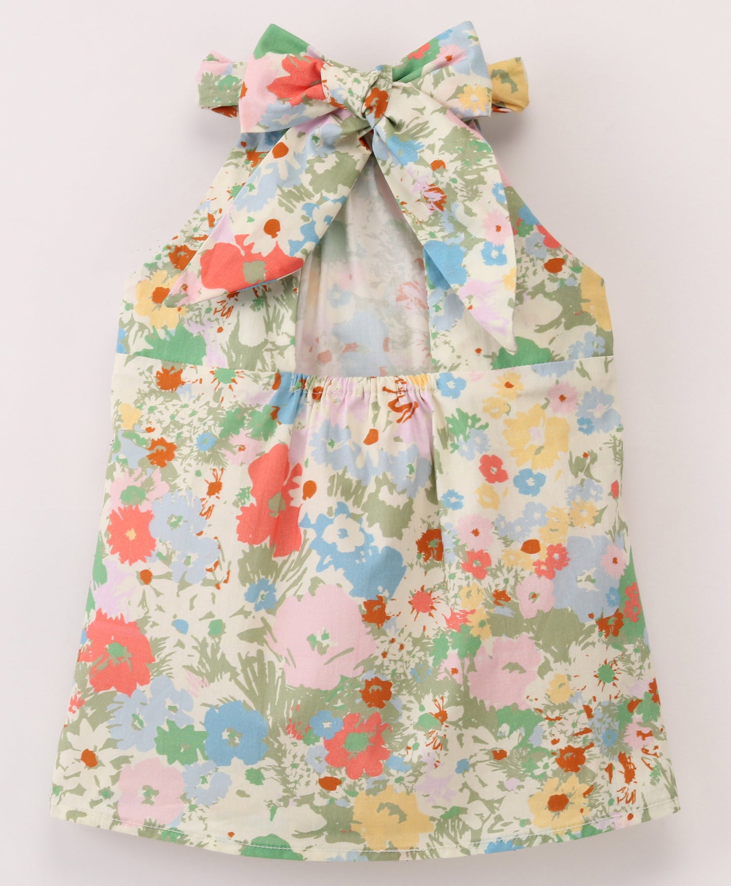 Pastel Floral print top with cut out at back and tie up at back neck