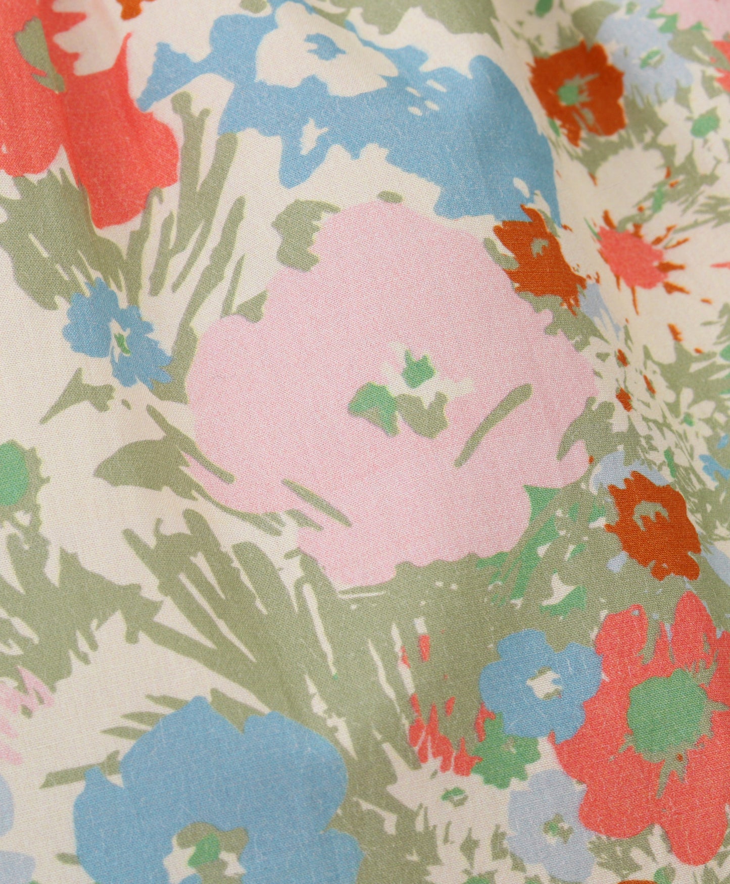 Pastel Floral print top with cut out at back and tie up at back neck