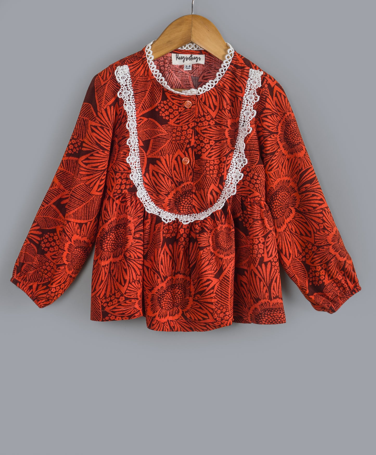 BRICK RED SELF PRINT TOP WITH CONTRAST LACE ALONG YOKE