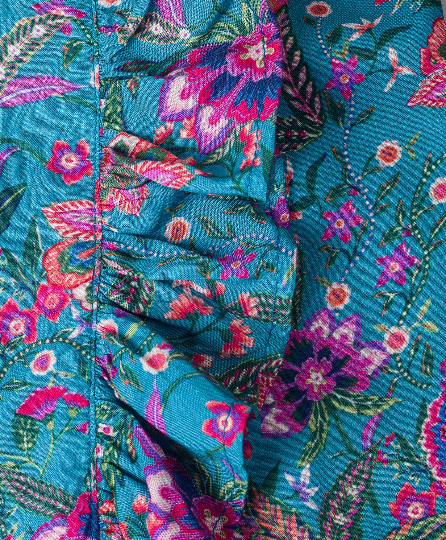 TURQ AND PURPLE FLORAL PRINT TOP WITH FRILLS ON THE FRONT SIDES
