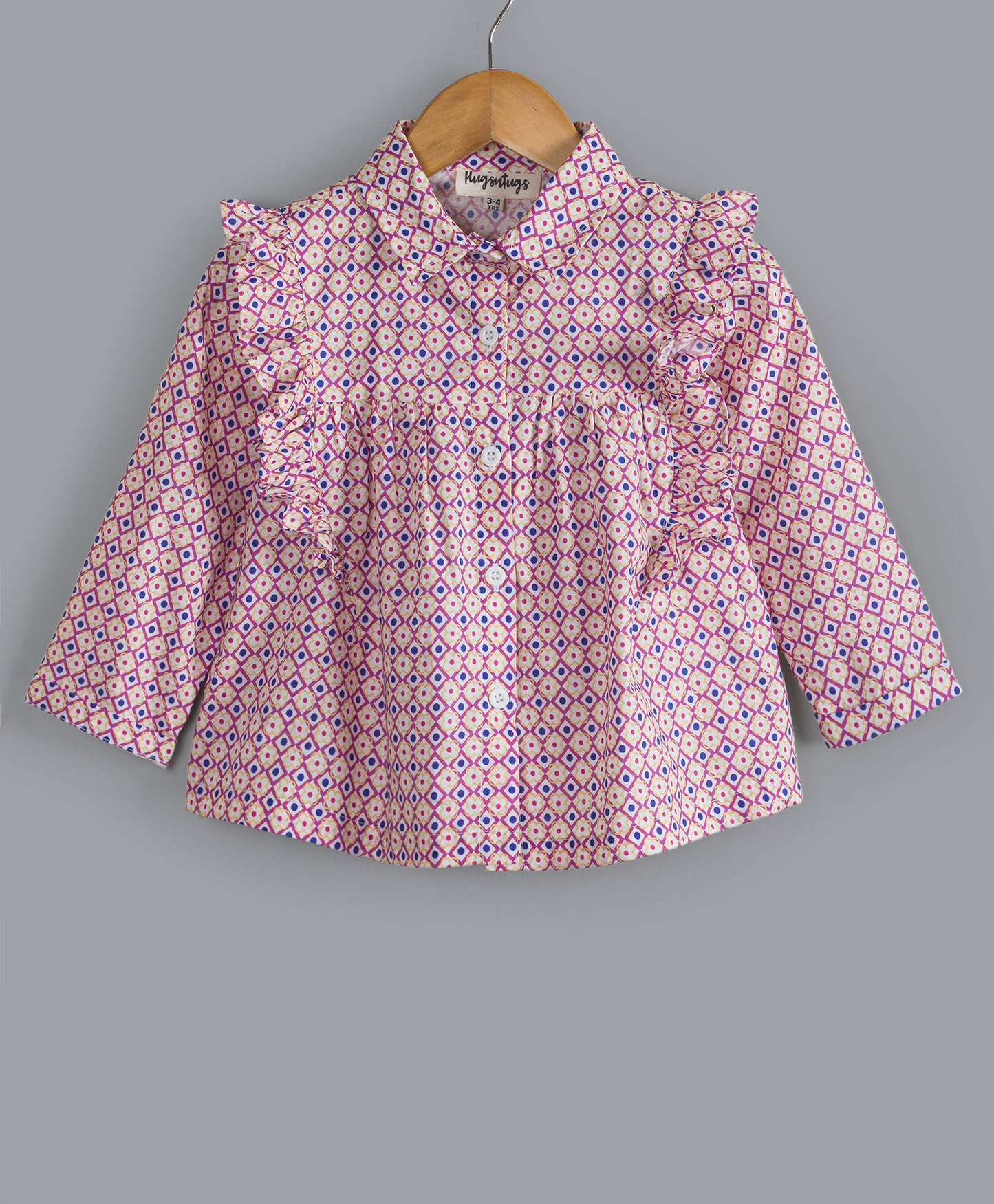 GEOMETRIC PRINT TOP WITH FRILLS ON THE FRONT SIDE