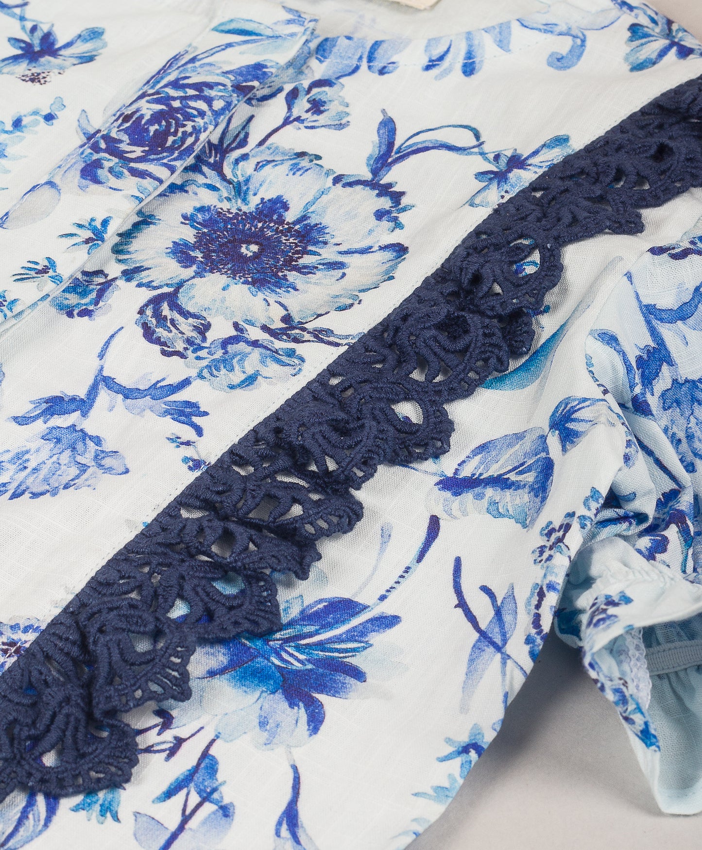 WHITE BLUE TOP WITH NAVY LACE ON FRONT SIDES