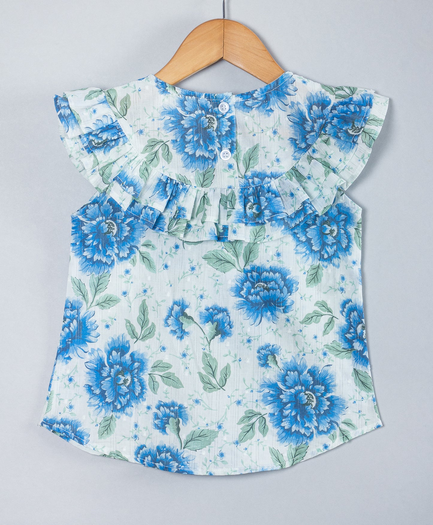 BLUE FLORAL PRINT TOP WITH FRILLS ALONG YOKE