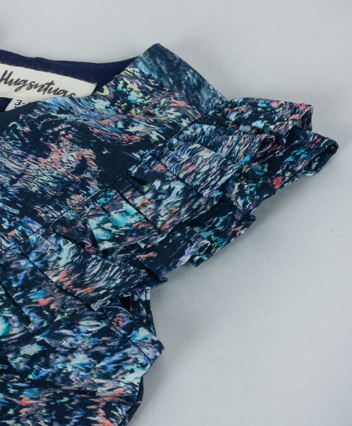 NAVY ALL OVER CHERRY BLOSSOM PRINT TOP WITH FRILL ALONG THE YOKE