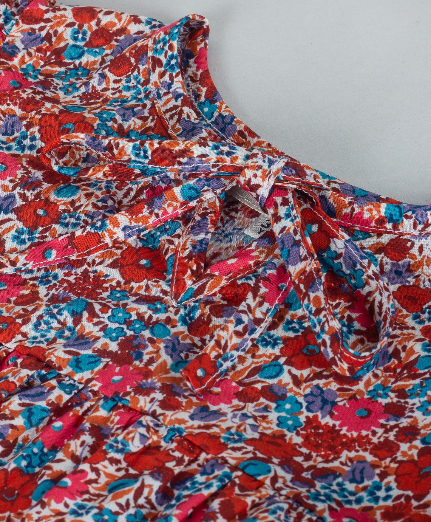 DITSY FLORAL PRINT TOP WITH SELF TIE UP AND FRONT NECK