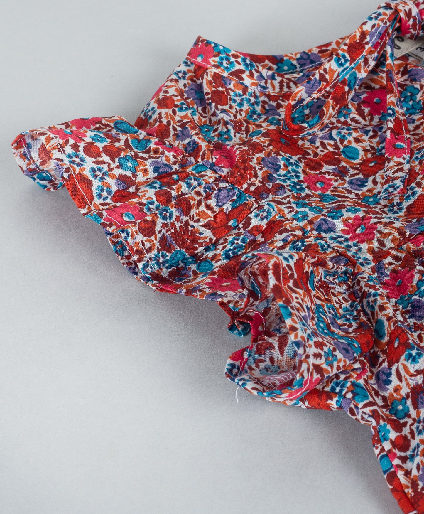 DITSY FLORAL PRINT TOP WITH SELF TIE UP AND FRONT NECK