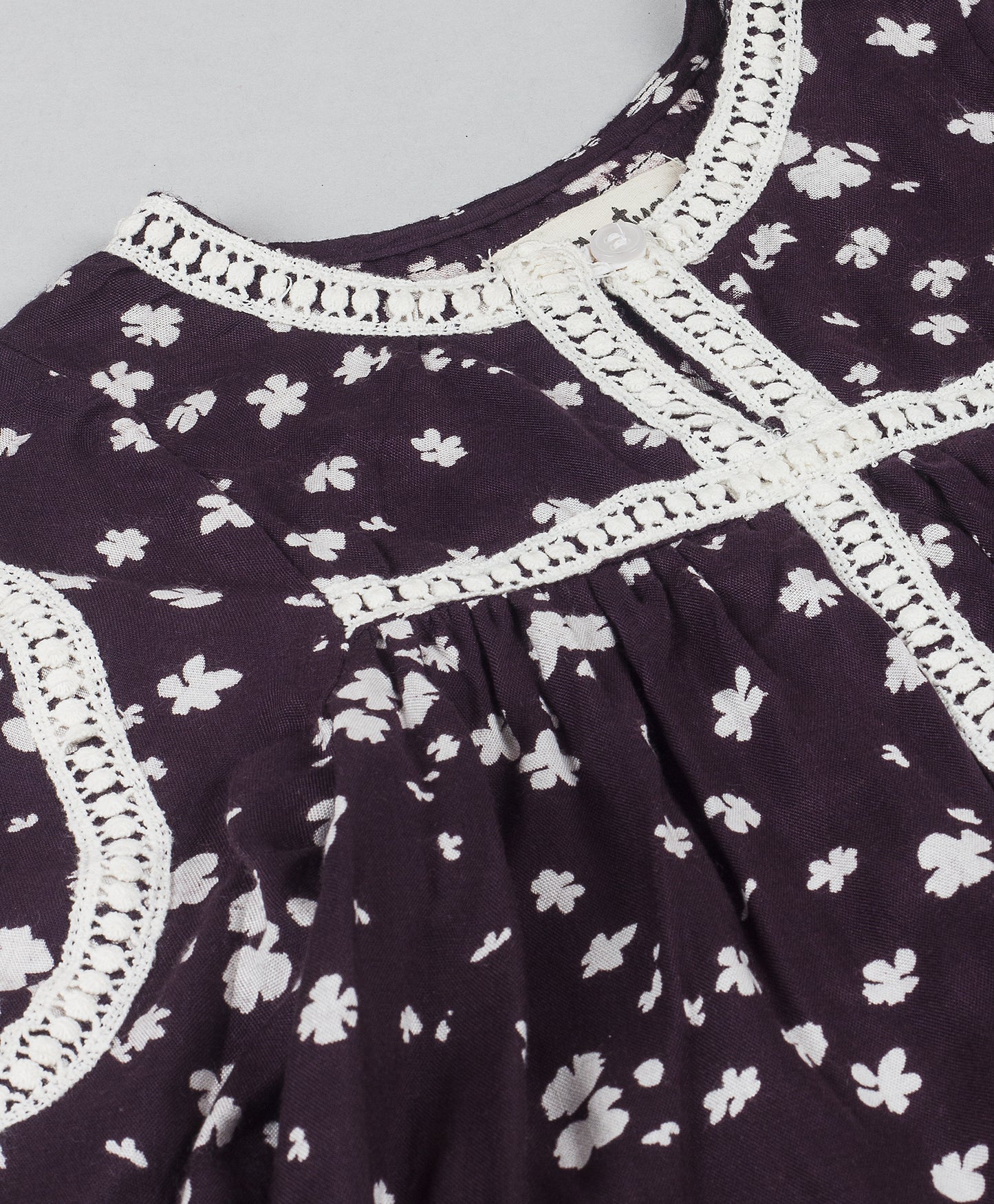 BLACK AND WHITE FLORAL TOP WITH WHITE LACE TRIMMINGS