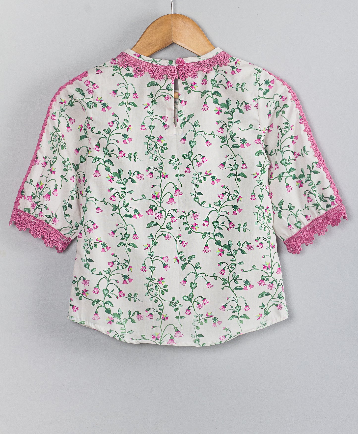 WHITE AND PINK FLORAL PRINT TOP WITH MATCHING LACE TOP APPLIED ON SLEEVES