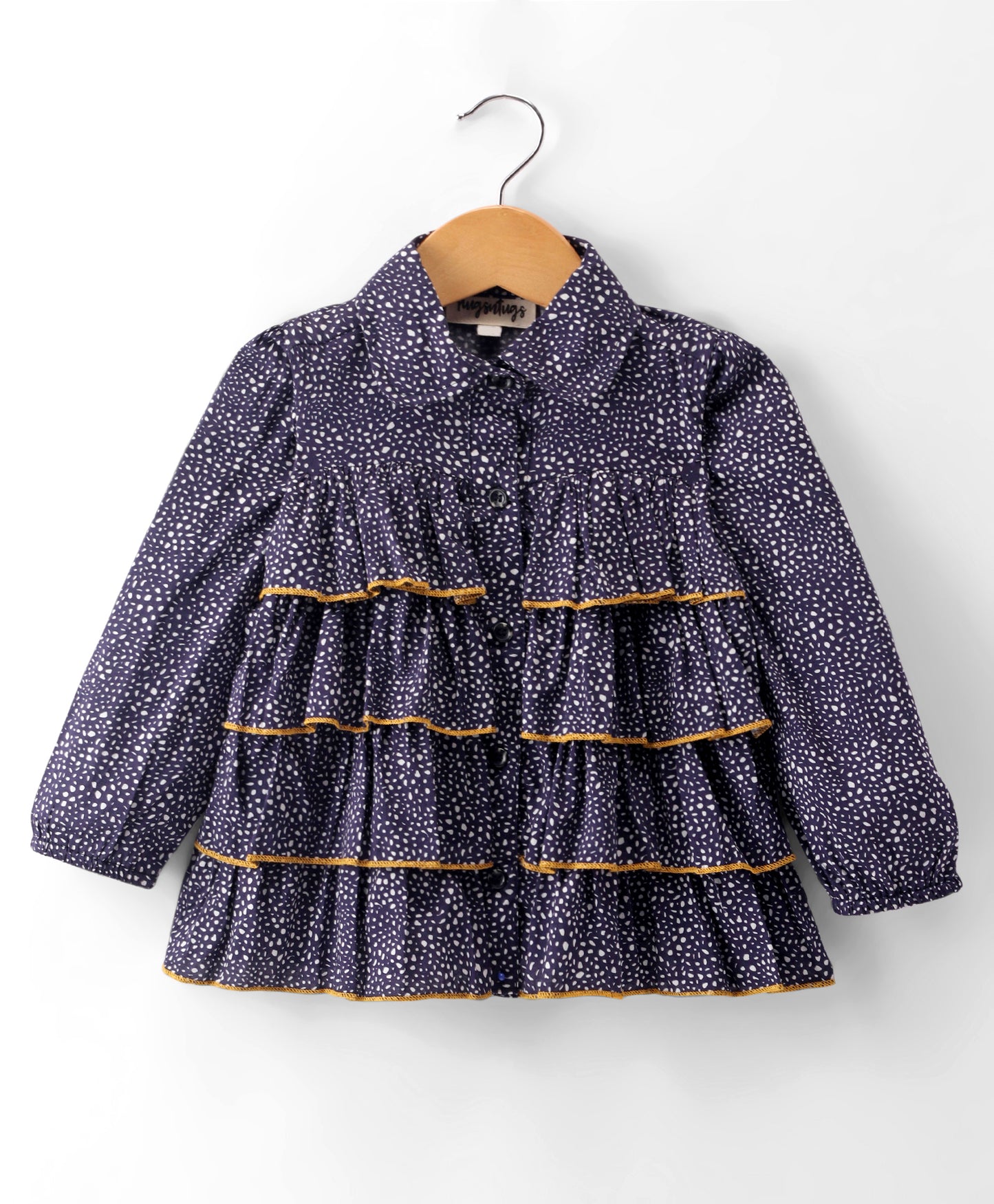 NAVY SMALL DOT PRINT TOP WITH MULTI LAYERS OF FRILLS