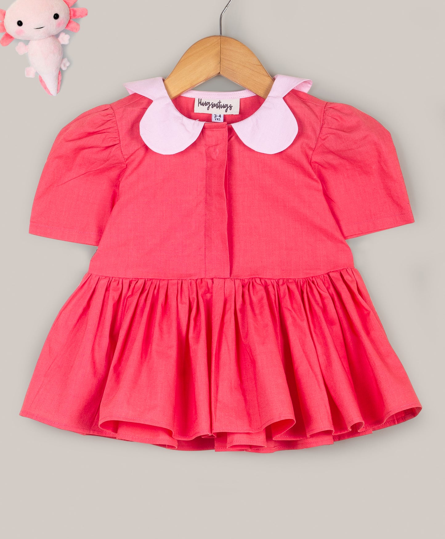 Solid Peplum top with flower shape collar
