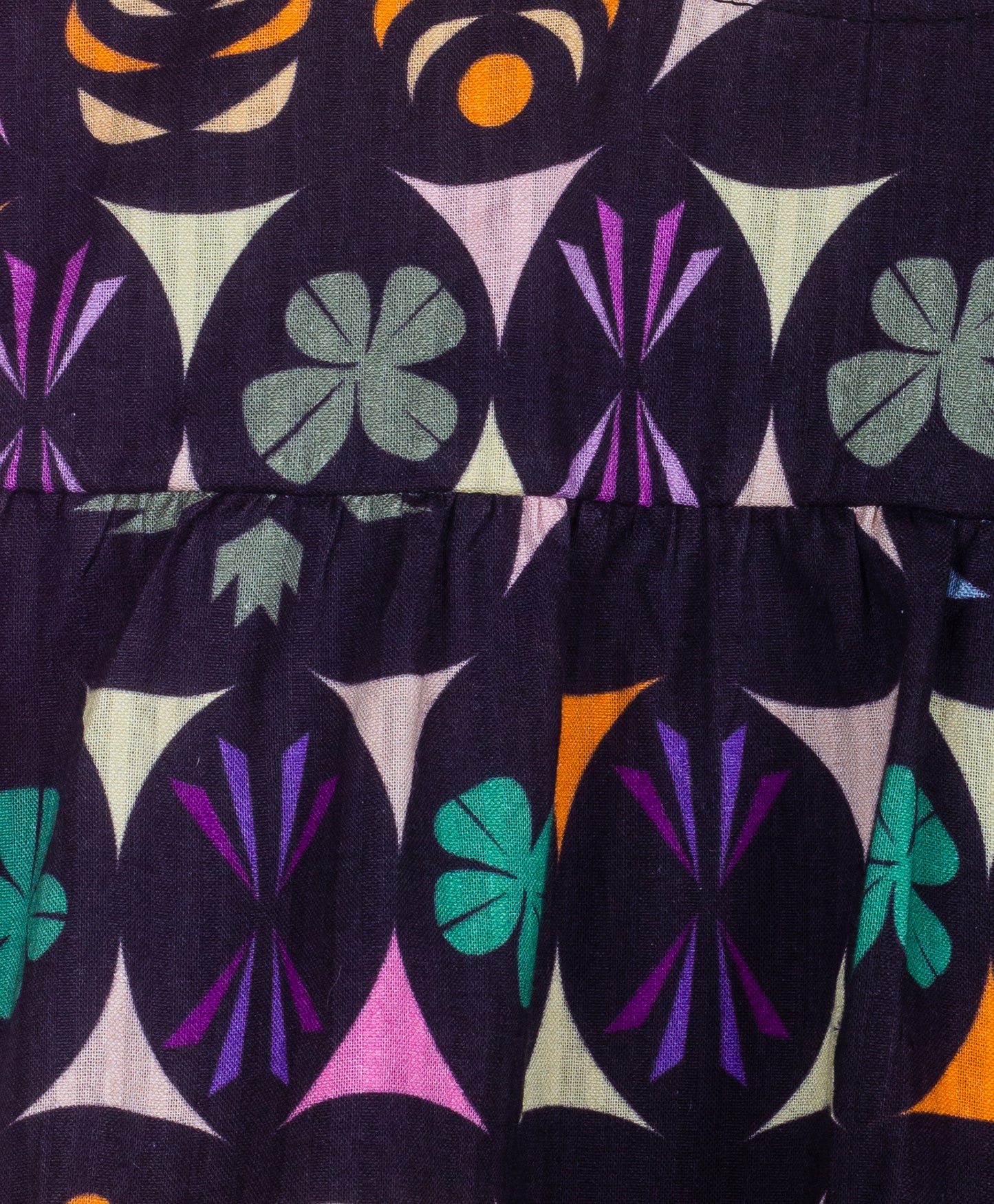 Kaleidoscopic print top with schiffli sleeves