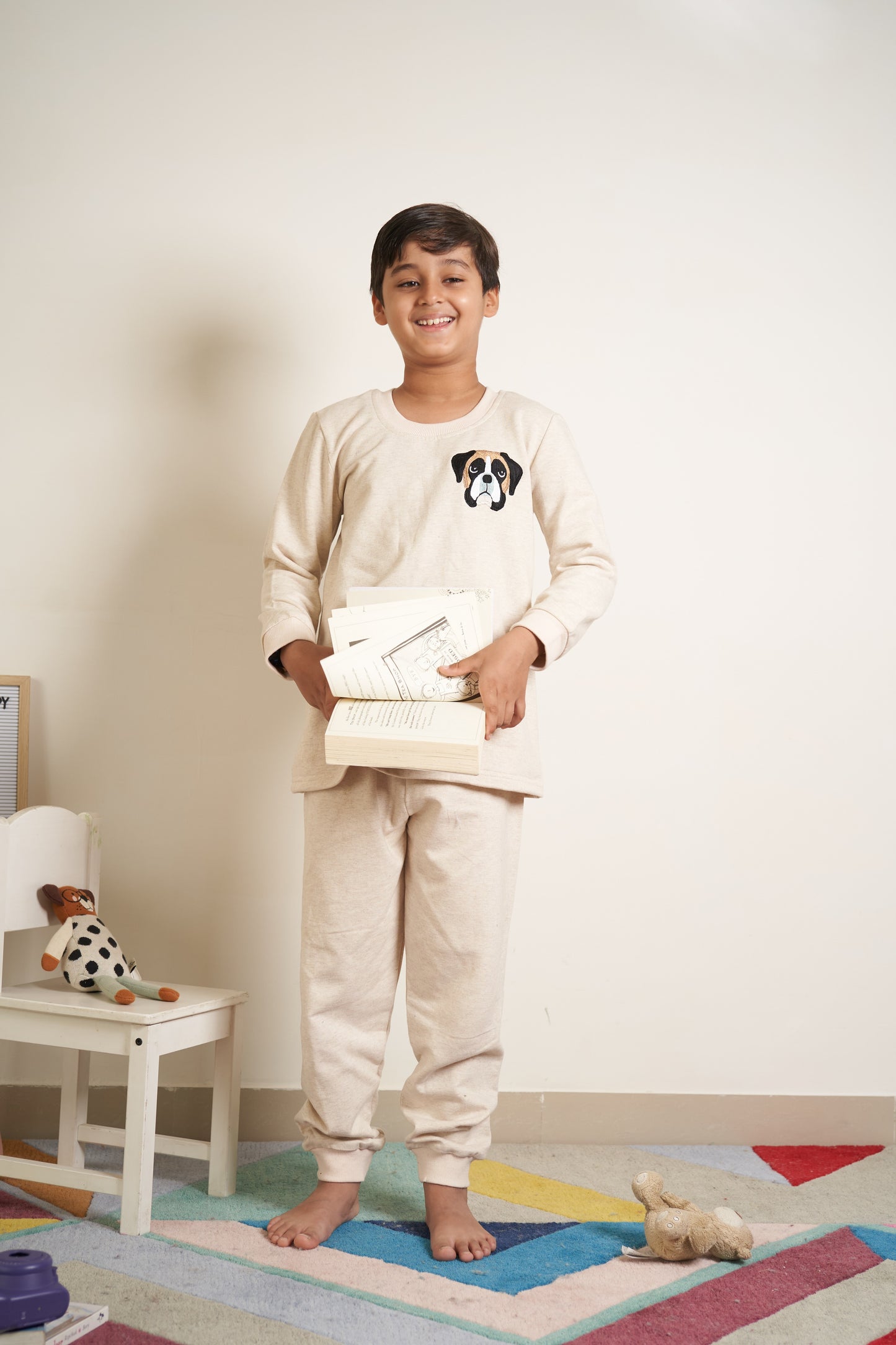Beige tracksuit with dog face embroidery on chest
