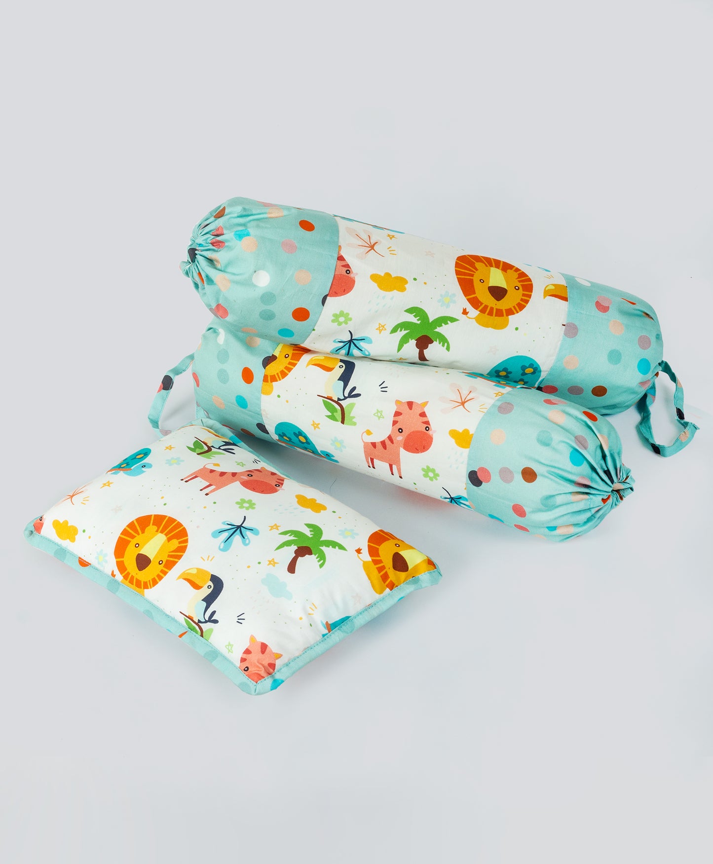 multi jungle print cot set with aqua multi dot side print