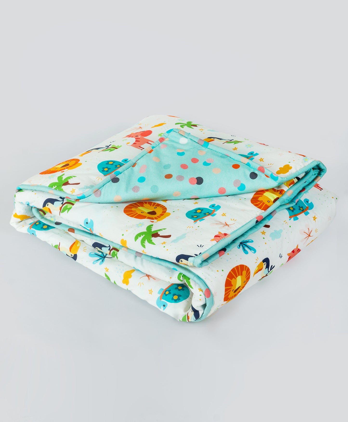 multi jungle print cot set with aqua multi dot side print