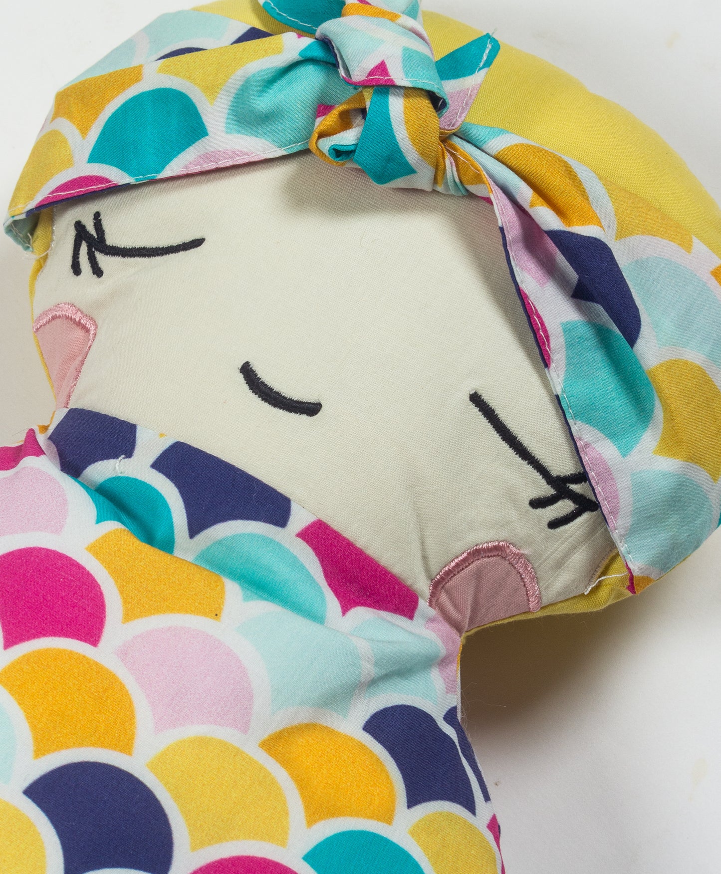 doll with headband cushion