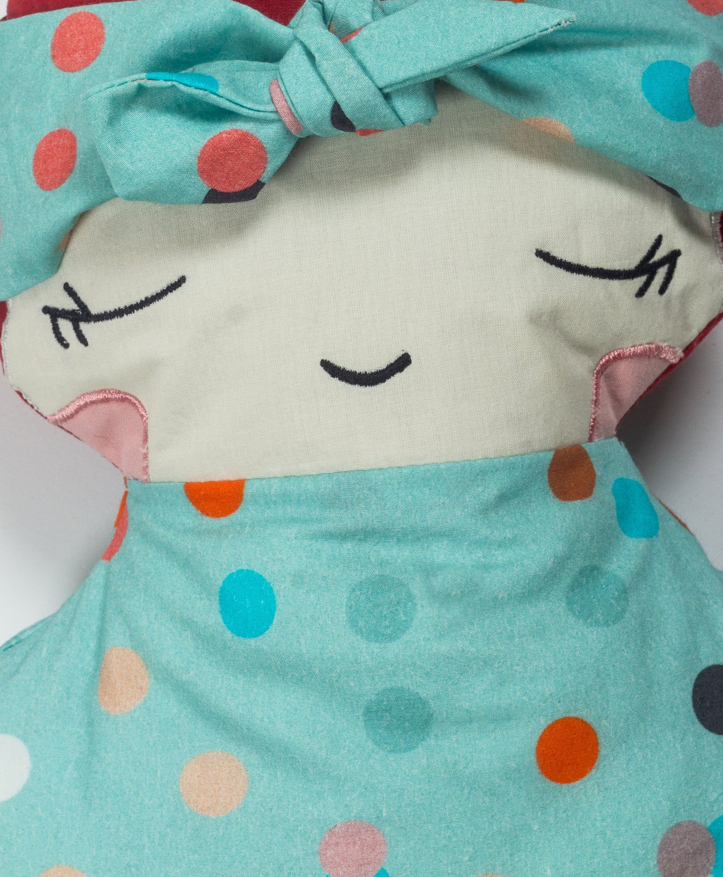 doll with headband cushion