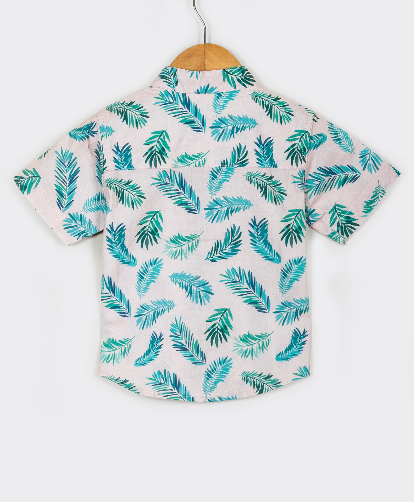Pink shirt with palm leaves print