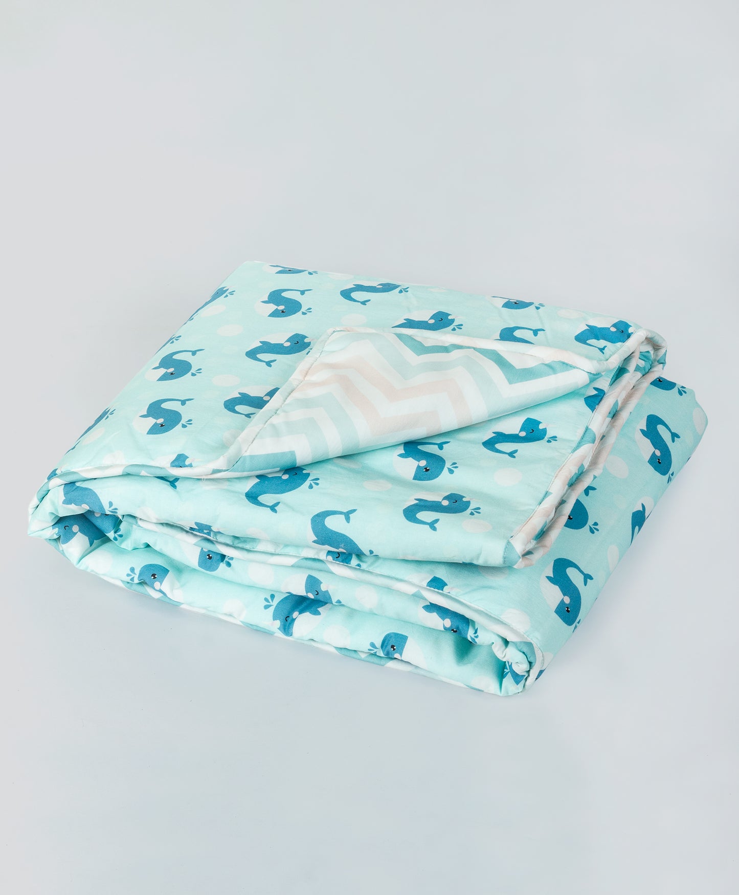 blue dolphin print AC quilt with blue chevron lining print