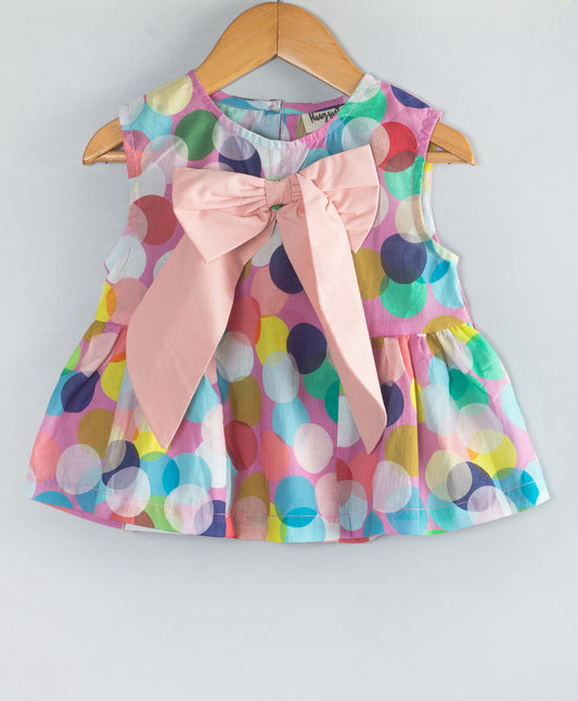 MULTI DOT PRINT TOP WITH CONTRAST BOW