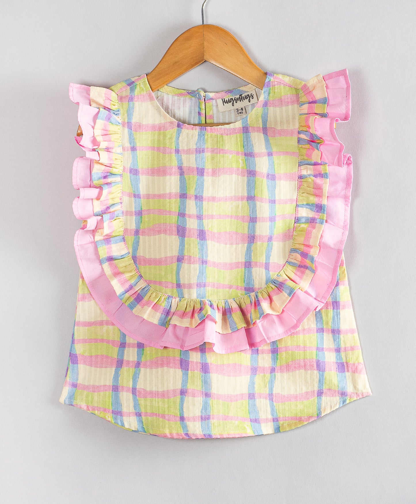 SOFT CHECK PRINT TOP WITH PINK FRILL