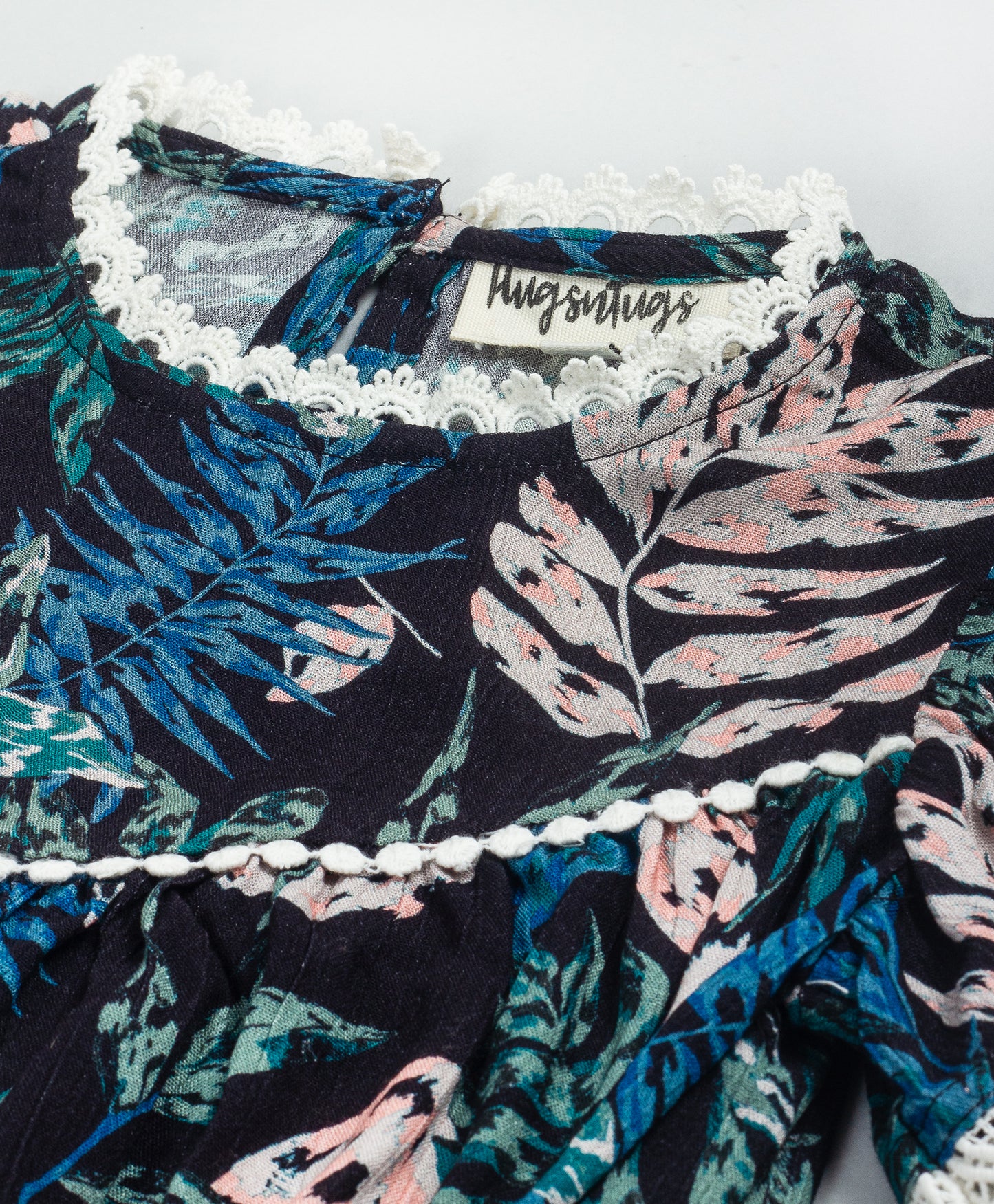 LEAF PRINT TOP WITH CONTRAST LACE DETAILING